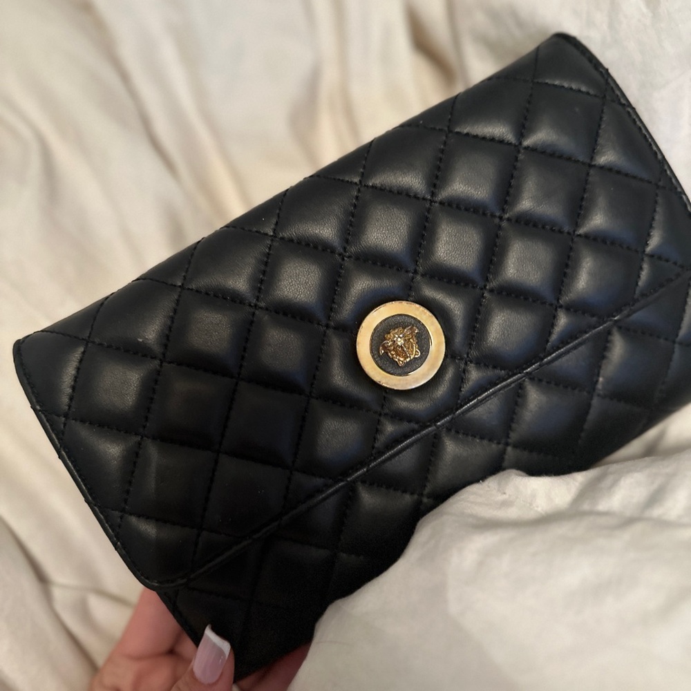 Versace
La Medusa leather clutch bag